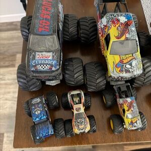 Monster Truck Toy Collection - Black, Yellow, Blue